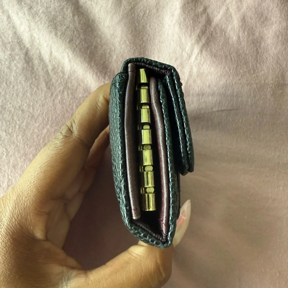 CHANEL Black Quilted Caviar Leather Key Holder with Gold CC